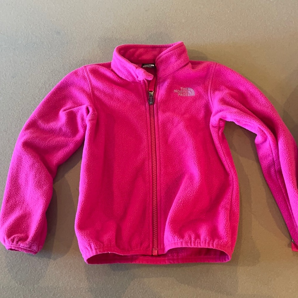 Northface waterproof girls coat. Pink shell zips into outer shell. Size 4T
